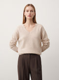 PULL COL V EN MAILLE DUVETEUSE