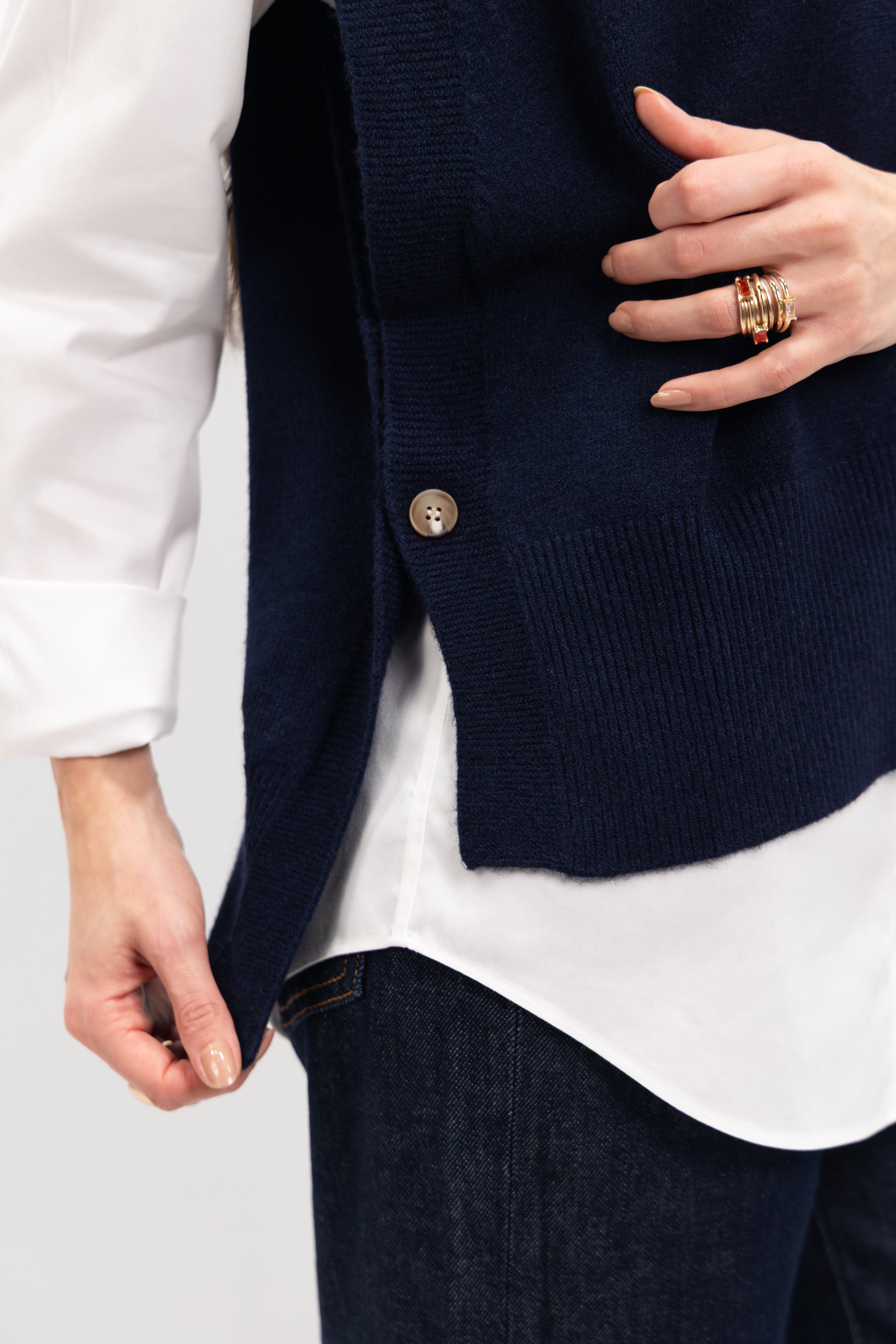 Pull poncho avec bouton sur les côtés